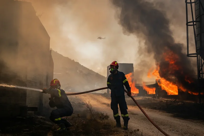 Greece ravaged by wildfires as hundreds of firefighters battle blaze near Athens