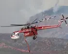 Utah wildfire blocks rescuers from reaching firefighting helicopter crash site