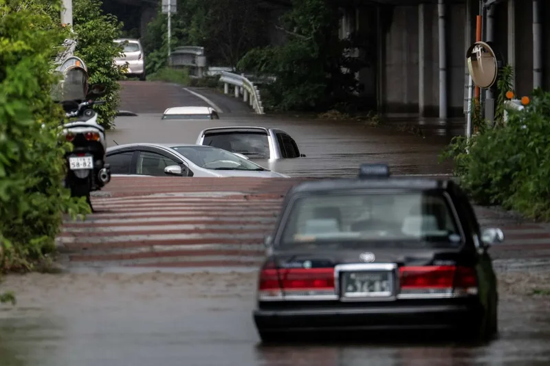 Record-breaking rain in Japan leaves several dead, thousands stranded