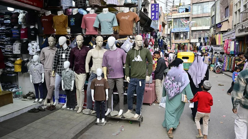Wares from big shops occupy footpaths, while small vendors fear eviction in Shivajinagar