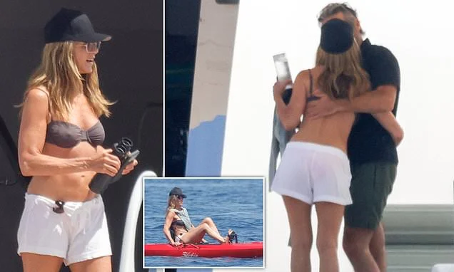 Bikini-clad Jennifer Aniston, 57, kisses hypnotist boyfriend Jim Curtis as they enjoy a romantic getaway aboard a luxury yacht in Spain