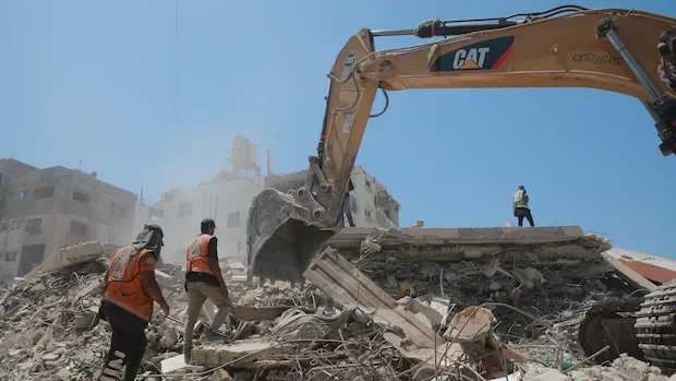 They own 2 excavators in Gaza and can't keep up with demand as families dig for remains