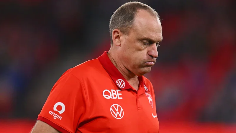 Longmire reveals 'incredible deep sadness' over Swans' links to police probe