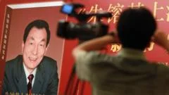 China censors public mourning as it holds former premier's funeral