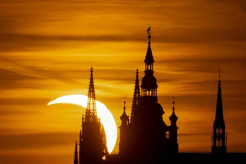 Rare solar eclipse captivates skywatchers across continents