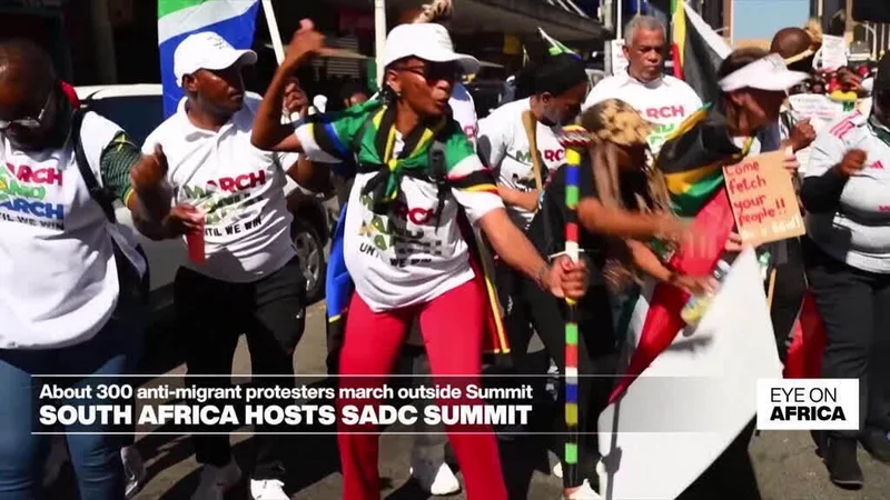 Anti-migrants protesters gather outside SADC Summit