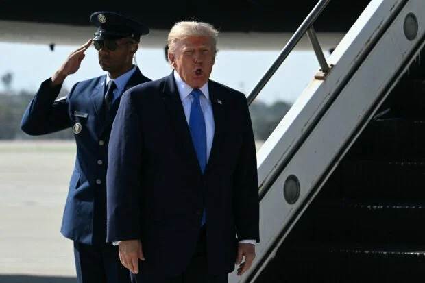 Trump warns Iran to open Hormuz or get 'hit very hard'
