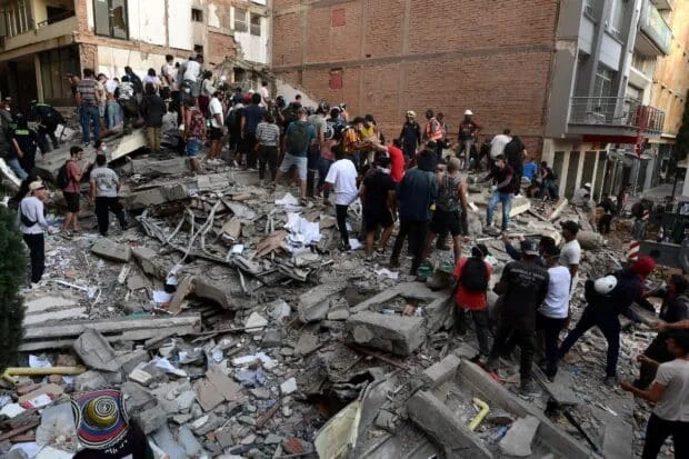 Colombia scrambles to find survivors as quake kills 111