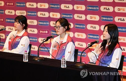 Olympic shooting champions trying to stay upbeat under pressure