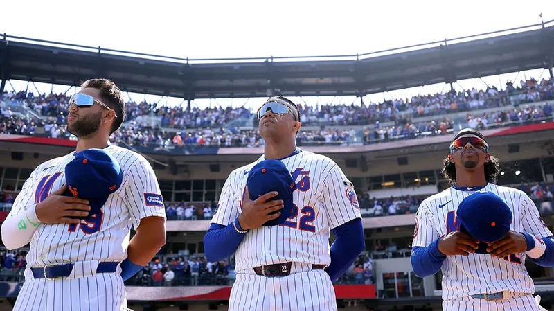 Sneaky raccoon seen helping itself to ballpark fare at Citi Field as bewildered Mets fans look on
