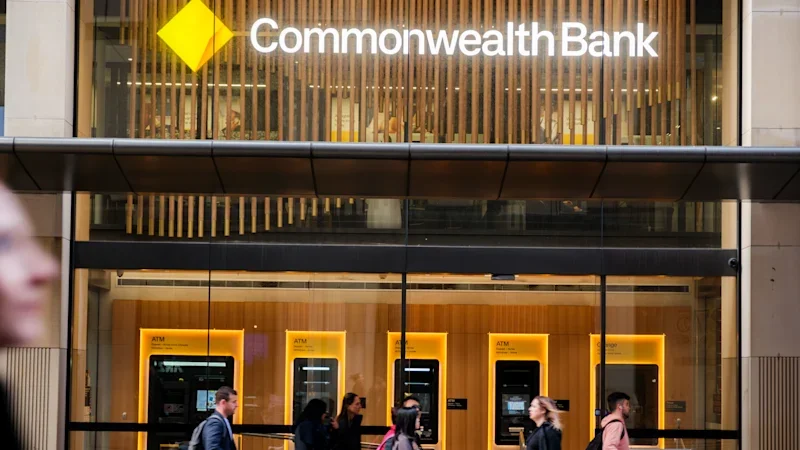 CBA profits hit $11 billion, dividend raised
