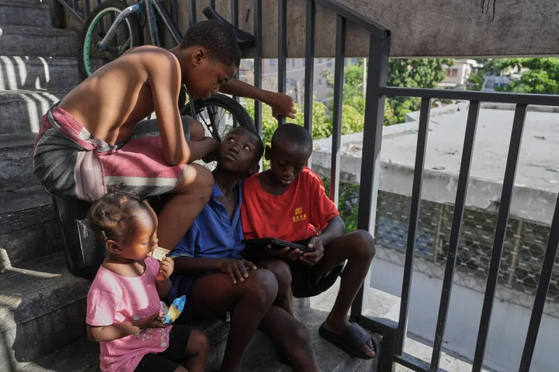 First group of deportees arrives in troubled Haiti after US ends TPS program