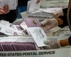Judge blocks Trump’s order preventing USPS from restricting mail-in voting