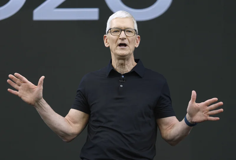 Apple's Tim Cook joined by Howard Lutnick in opening Houston manufacturing plant
