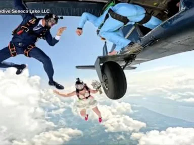 WATCH:  Skydiving couple gets married in midair