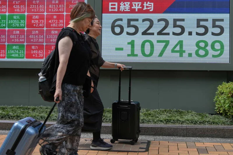 Asian shares are mostly lower as Kospi falls 4% and tech giants decline on Wall Street