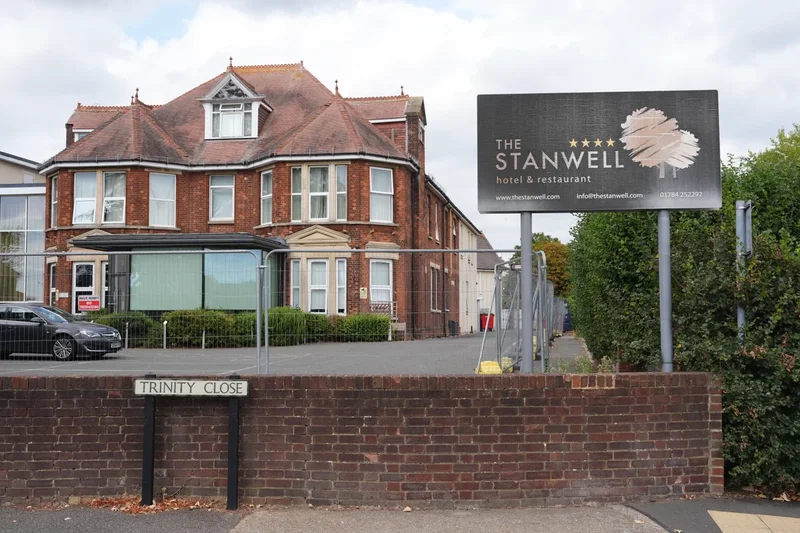 Support staff worker stabbed at Surrey hotel used to house asylum seekers, MP says