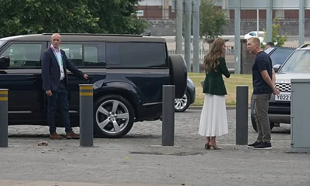 There's no rushing our future Queen: Kate keeps Prince William and their children waiting as sweet clip shows unhurried Princess finishing her chat with cancer-stricken Sir Chris Hoy
