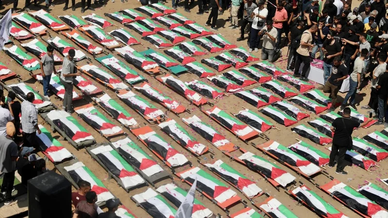 Gaza families bury 112 people recovered nearly three years after Israeli strikes