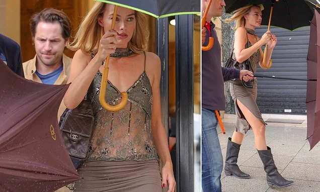 Margot Robbie wears sheer top and thigh-split skirt as she's joined by husband Tom Ackerley in Paris during break from filming Ocean's Eleven prequel