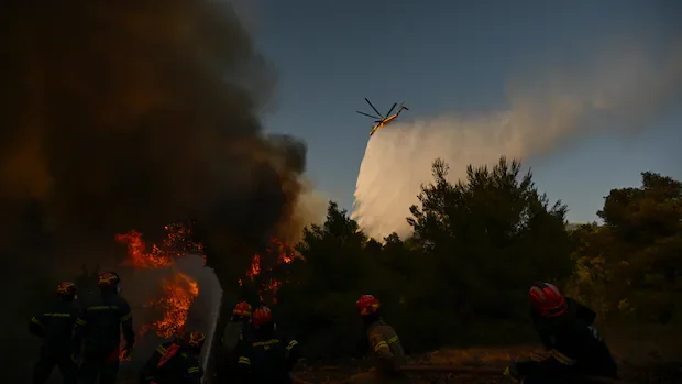 2 killed after helicopters battling Greece wildfires collide