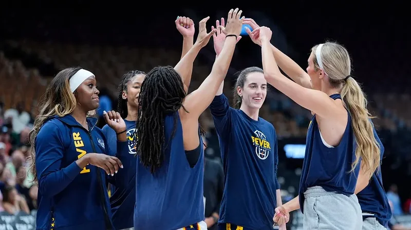 Caitlin Clark helps lift Fever past Tempo after Kelsey Mitchell sits out late while 'overheated'