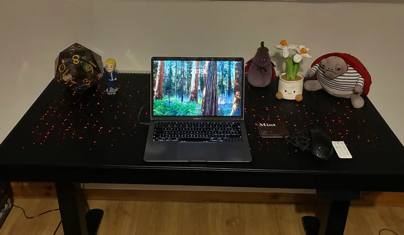 I spent two months using the Eureka Ergonomic Wonder Glowing Glass Desk, and it's beautiful — but there's one small problem