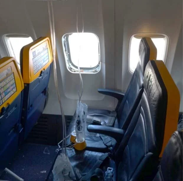 NTSB: Engine parts shattered Ryanair window that sucked in man's head