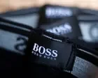 Sports Direct owner Mike Ashley tightens hold on Hugo Boss