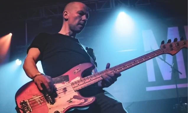 Tributes pour in for 'adored' musician, 45, who supported the Wombats dies in crash with tractor