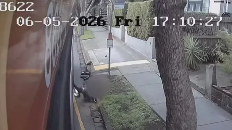 Shocking footage shows toddler’s legs trapped in bus doors