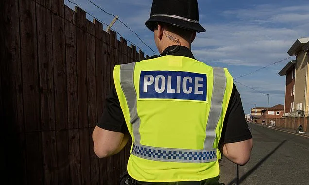 Student police officer, 23, allegedly 'bundled' woman into his car and raped her before 'driving off at 125mph' with her inside, court told