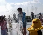 Hong Kong records hottest day ever as Typhoon Dolphin fuels heatwave