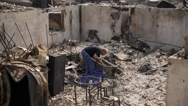 'It's just ash': Washington state wildfire evacuees return to find devastation