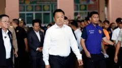 Thai PM vows to introduce stricter gun laws after eight killed in shooting