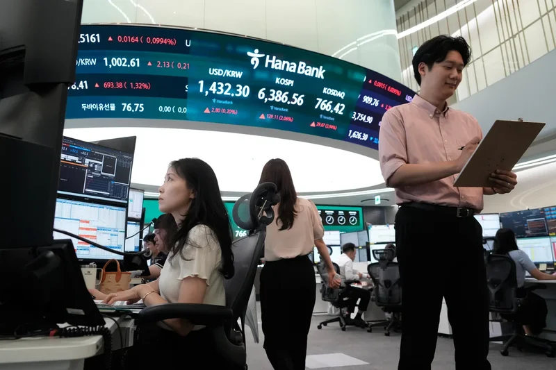 Asian shares mostly dip after US stocks rally