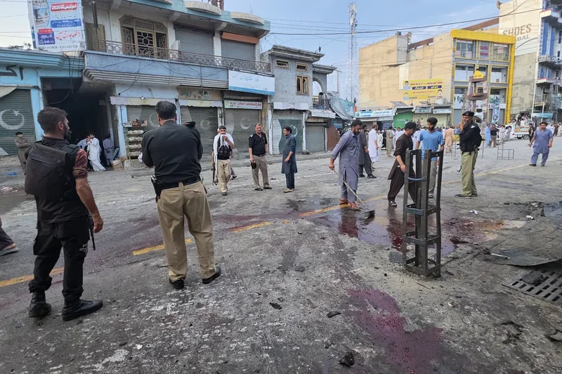 A suicide bomber strikes an anti-militant rally in northwestern Pakistan, killing at least 14