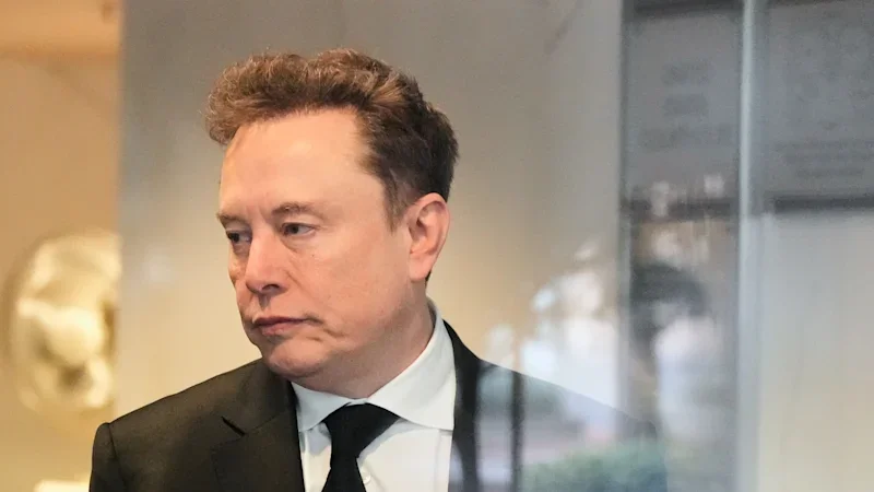 Why the richest man on Earth wants you to think money won’t matter