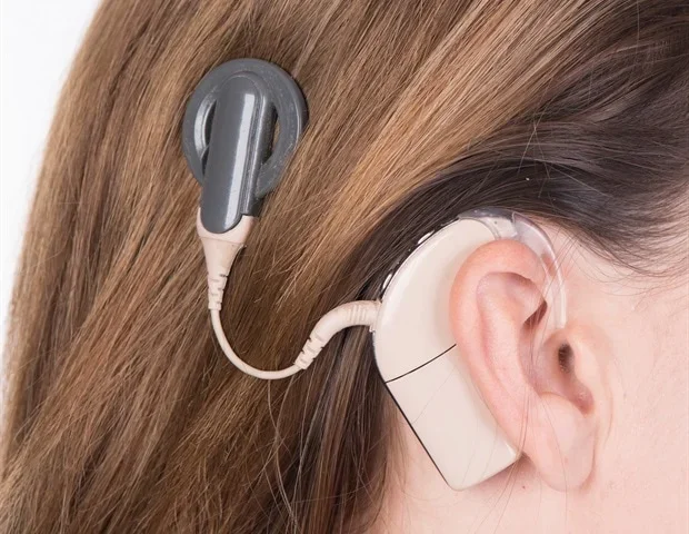 Harnessing neuroplasticity to improve cochlear implant adaptation