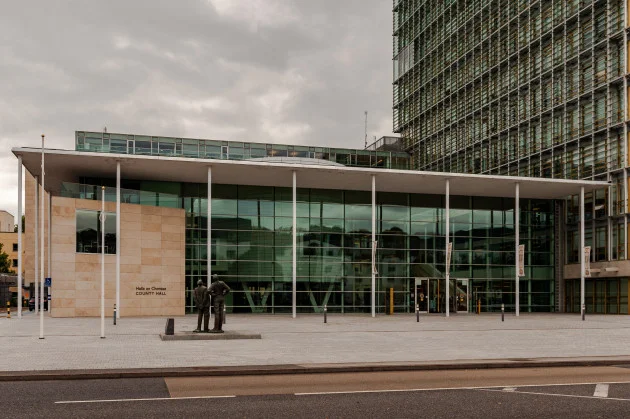 Cork councillors vote for language condition which clashes with Government policy