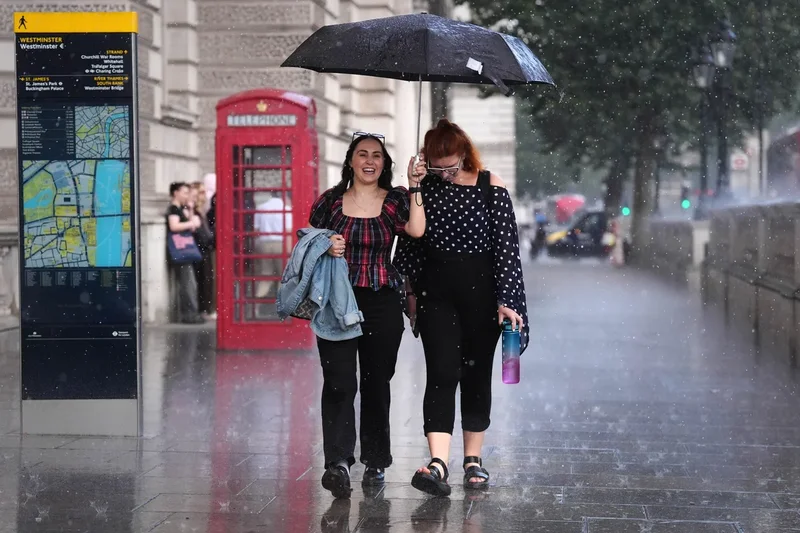 Flash flood warnings for UK as heavy rain batters drought-hit ground