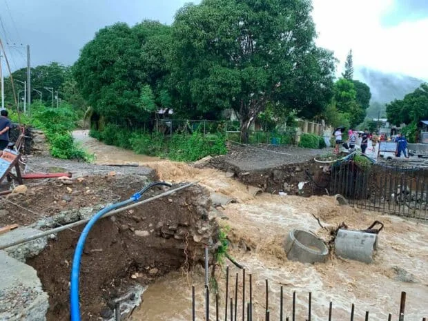 Strong currents, heavy rainfall damage Ilocos Sur bridge