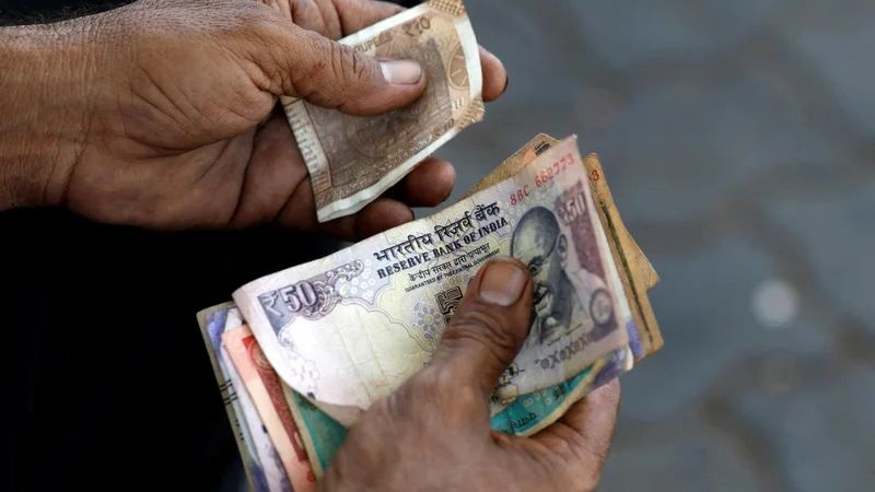 Rupee falls 12 paise to close at 95.45 against U.S. dollar