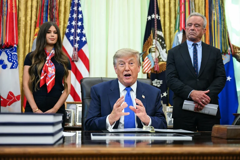 Trump signs executive order calling for fewer childhood vaccines, falsely linking shots to autism