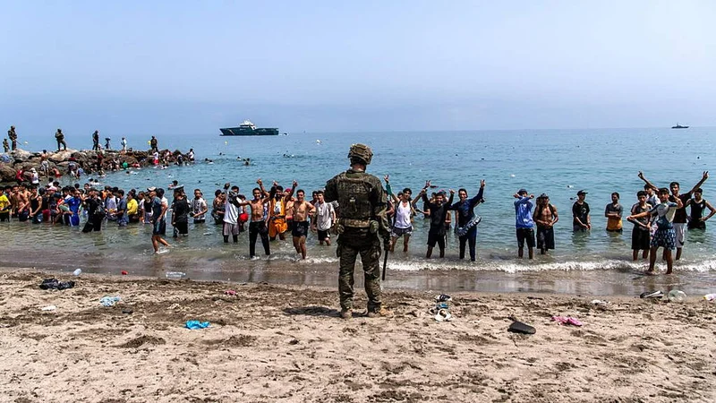 Spain installs sea barrier on Ceuta’s border after frontier rush that killed 67