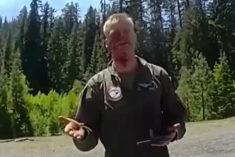 Bloodied military pilot greets police after walking away from horror fighter jet crash