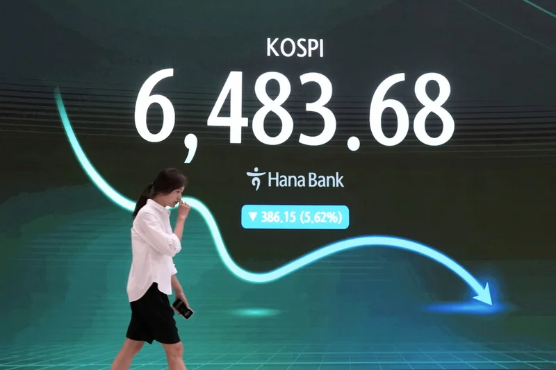 Shares fall in Asia, with Kospi down 5.2%, while oil prices jump