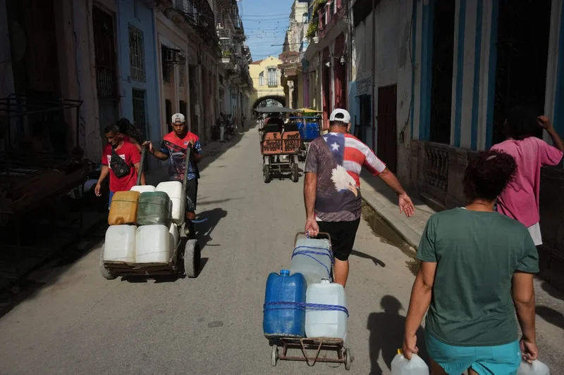 Life in Cuba revolves around small bursts of electricity as blackouts last for days