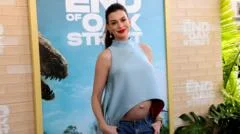Anne Hathaway pokes fun at 'fake baby bump' theories