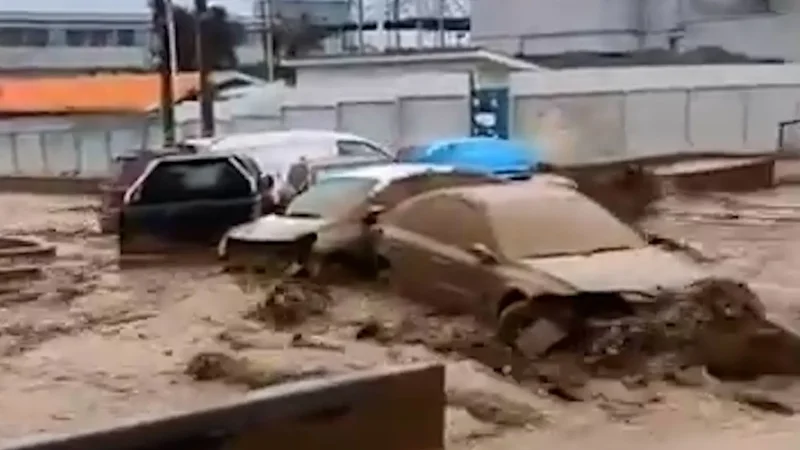 Cars swept downhill as flash floods hit northern Chile